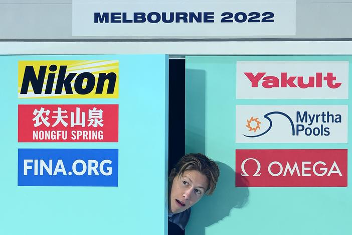 Henrik Christiansen, pictured at a 2022 championship medal ceremony in Australia, is chasing medals as well as chocolate muffins in his third Olympic Games. 