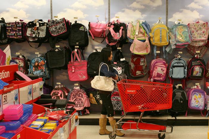 A Target customer shops for school supplies. The average family is projected to spend $875 on back-to-school shopping in 2024, according to the National Retail Federation.