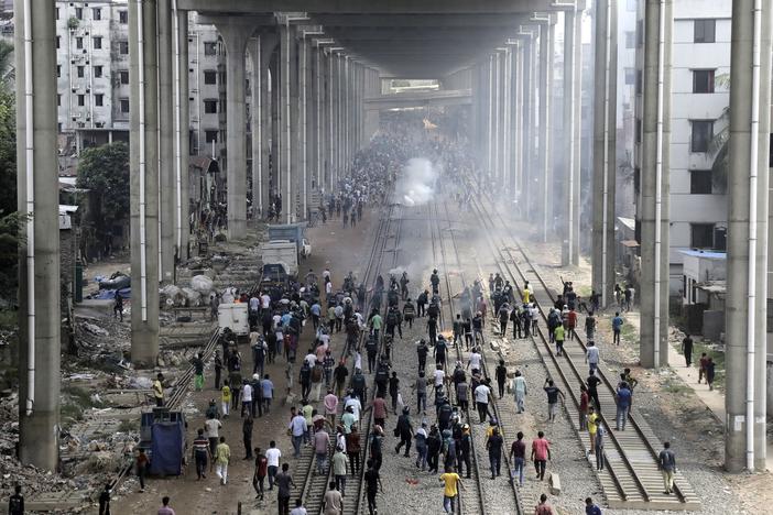 Students clash with police during a protest over a controversial quota system for government job applicants in Dhaka, Bangladesh on July 18.