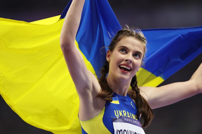 Gold medalist Yaroslava Mahuchikh celebrates her win in the women's high jump final at the Paris Olympic Games, on a day when Ukraine won three medals. Ukrainian athletes are dedicating their victories to the Ukrainian people who face a grinding invasion by Russia.