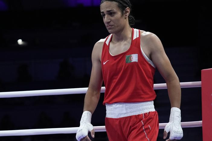 Algeria's Imane Khelif, reacts after defeating Italy's Angela Carini in their women's 66kg preliminary boxing match at the 2024 Summer Olympics, Thursday, in Paris.