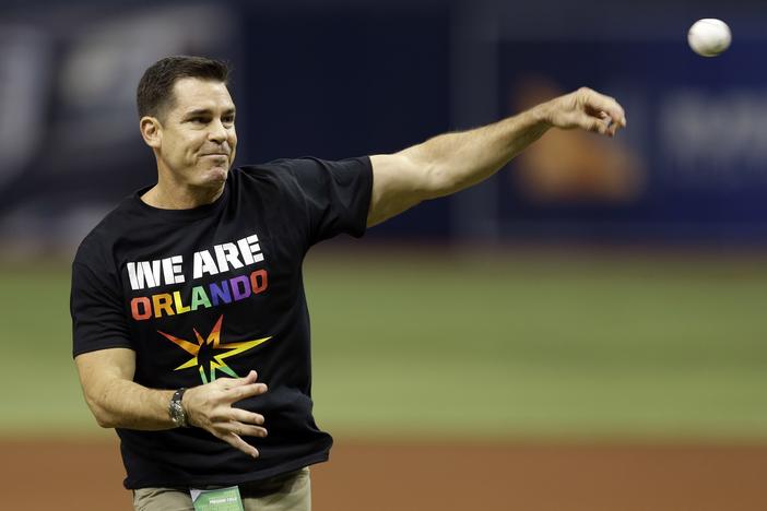 Bill Bean, MLB's vice president of Social Responsibility and Inclusion, throws out the ceremonial first pitch before a baseball game between the Tampa Bay Rays and the San Francisco Giants in 2016 in St. Petersburg, Fla. 