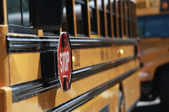 RICHMOND HEIGHTS, FLORIDA - MARCH 11: An electric bus is parked as U.S. Environmental Protection Agency Administrator Michael S. Regan visits during an event to highlight funding for electric school buses at the Coral Reef High School on March 11, 2024 in Richmond Heights, Florida. 