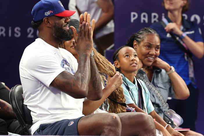 LeBron James cheers on fellow Team USA basketballers in the 3x3 women's game against Spain last week at Esplanade Des Invalides during the Paris Games.