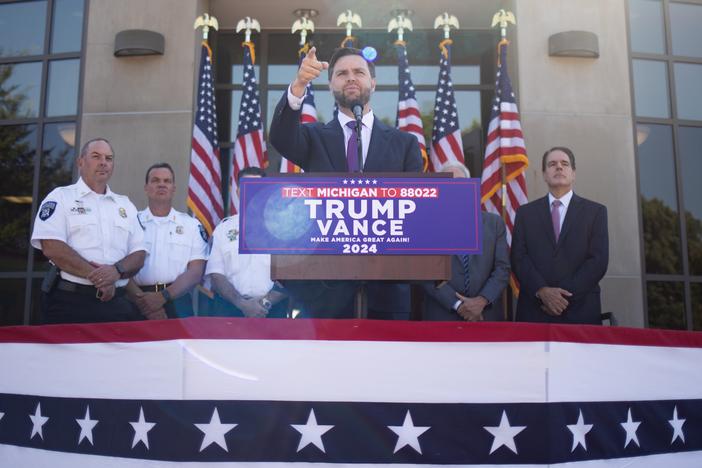 Republican vice presidential nominee JD Vance, a U.S. senator from Ohio, speaks during a press conference at the Shelby Township Police Department on Wednesday in Shelby, Mich.