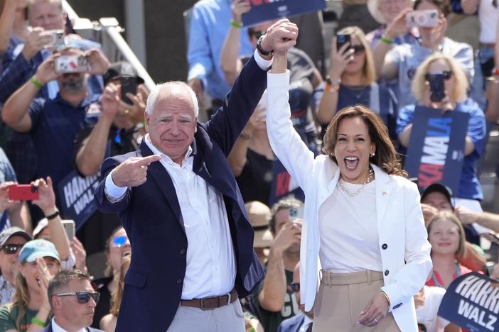 Democratic presidential nominee Vice President Kamala Harris is welcomed by Democratic vice presidential nominee Minnesota Gov. Tim Walz, before she delivers remarks at a campaign event, Wednesday, Aug. 7, 2024, in Eau Claire, Wisc.