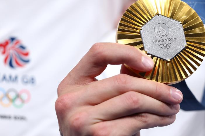 Gold medals are the big prize in Paris. China and the U.S. are running neck and neck when it comes to gold. But on a per capita basis tiny Australia is punching above its weight.