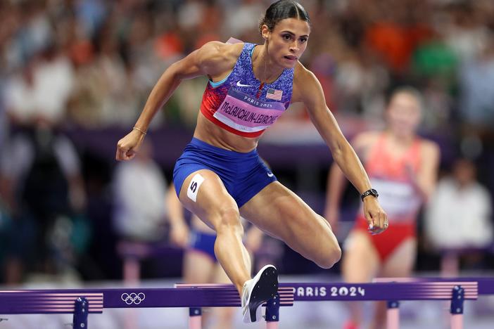 USA's Sydney McLaughlin-Levrone easily won gold in the women's 400m hurdles at the Paris Olympics on Thursday. She also broke her own world record at Stade de France.