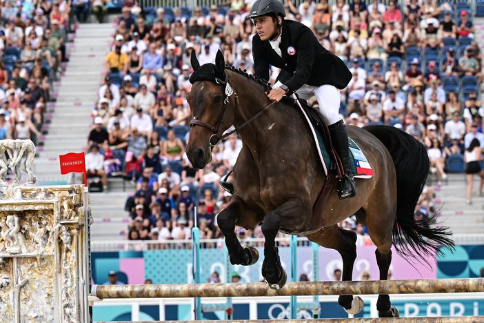 Chile's Esteban Bustos competes in the men's riding show jumping of the modern pentathlon during the Paris 2024 Olympic Games at the Chateau de Versailles in Versailles on Friday. The equestrian portion of the Olympic modern pentathlon will end after these Games — replaced with ... 