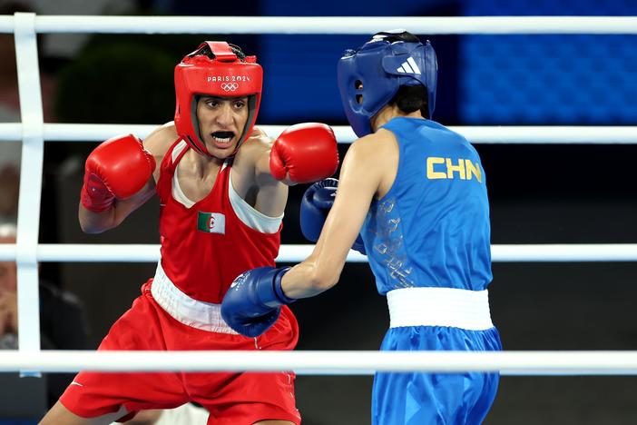 Imane Khelif of Algeria (L) defeated Liu Yang of China to win Olympic gold in the women's 66-kilogram boxing event. 