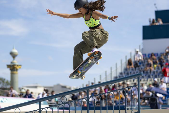Rayssa Leal of Brazil competes in the women's skateboarding street final at the Place de la Concorde. She won a bronze medal. The 16-year-old Olympian remembers that when she was a kid, a pair of sneakers without holes were an implausible dream.