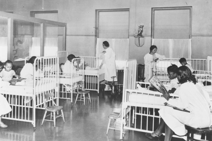Nurses attend to patients in this historical photo of the children's ward inside Wheatley-Provident Hospital, a Black hospital in Kansas City, Missouri. It opened in 1918, but, like most Black hospitals, it closed following the federal campaign to desegregate hospitals in the 1960s. 