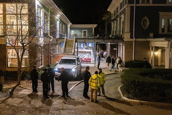 Police and security stand outside the Center for Jewish Living at Cornell University in Ithaca, N.Y., in early November, after antisemitic threats left the community on edge. 