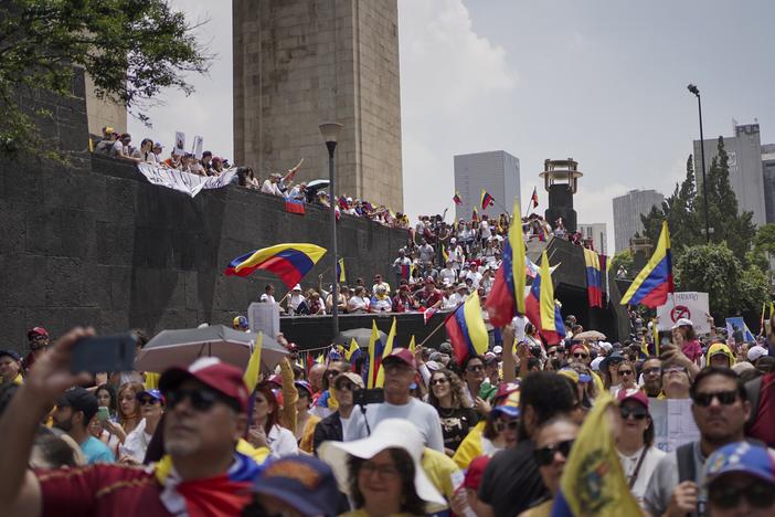 Venezuelan nationals protest against the official results that declared President Nicolas Maduro the winner of the July presidential election, in Mexico City, on Saturday.