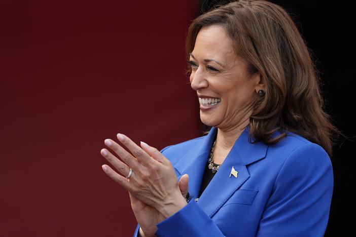 Democratic presidential nominee and Vice President Kamala Harris greets members of the Aliquippa High School football team during a campaign stop at their school, Sunday in Aliquippa, Pa.
