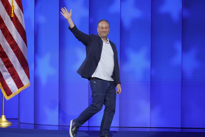 Second gentleman Doug Emhoff tests the stage ahead of the Democratic National Convention at the United Center on Aug. 19, 2024.