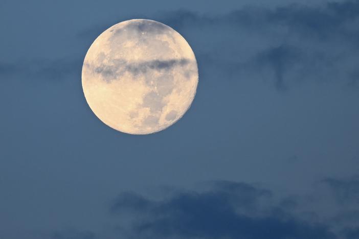 The sturgeon supermoon over Vanderbilt University's West End Tower in Nashville, Tenn., in August 2023.