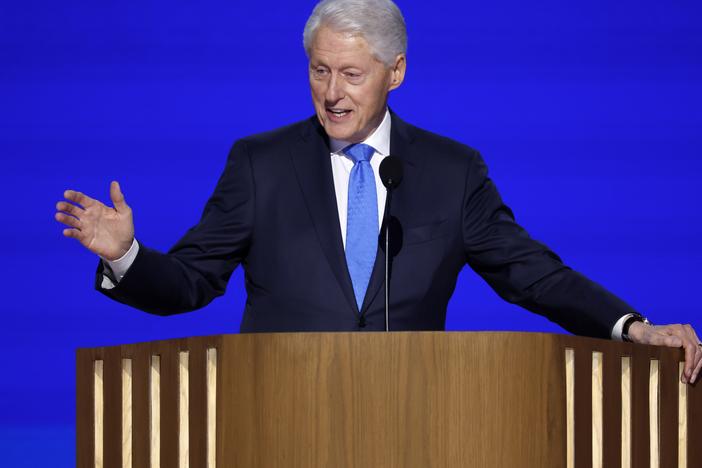 Former U.S. President Bill Clinton speaks on stage during the third day of the Democratic National Convention in Chicago, Illinois.