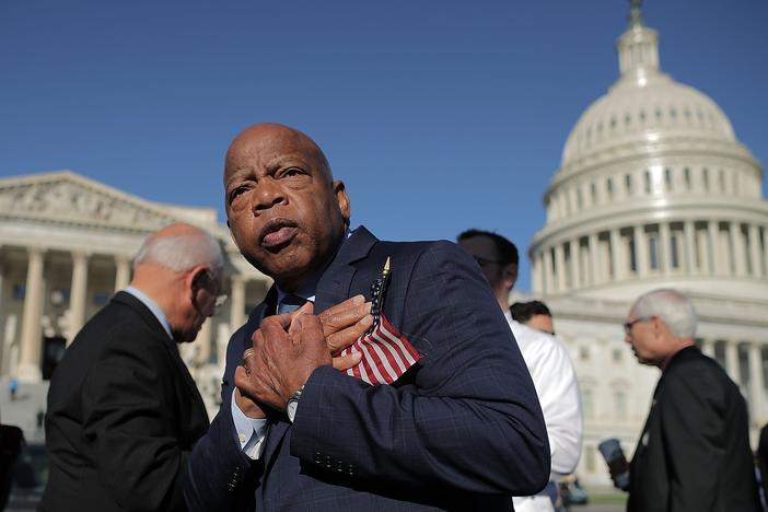 Rep. John Lewis thanks anti-gun violence supporters following a rally outside the U.S. Capitol on Oct. 4, 2017.