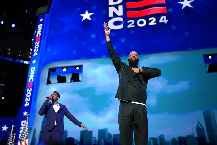 Rapper Common (R) and musician Jonathan McReynolds perform during the second day of the Democratic National Convention on August 20, 2024 in Chicago, Illinois.
