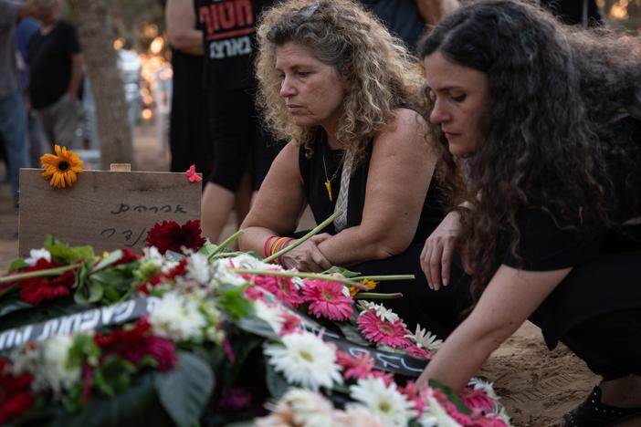 Family members attend the funeral of Abraham Munder, 79, in Nir Oz, Israel, on Aug. 22. He was taken hostage from Israel in a Hamas-led attack last Oct. 7 and his body was one of six recovered by Israeli forces from Gaza this week.
