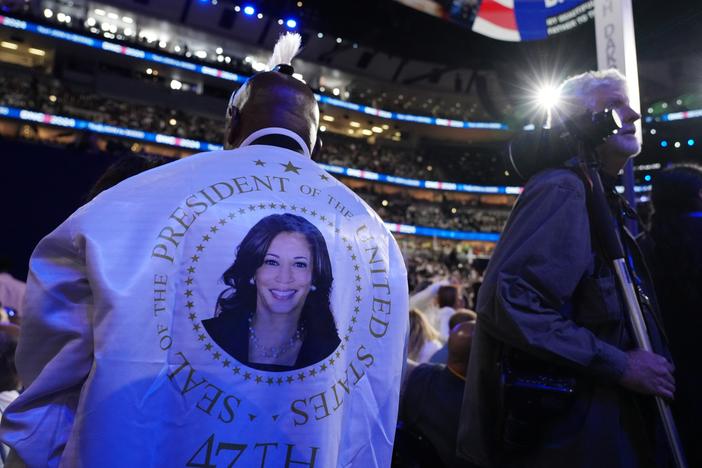 Delegates and journalists roam the floor of the United Center on the final day of the DNC.