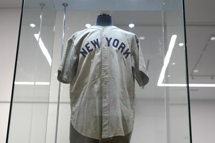 Babe Ruth's New York Yankees jersey, that he's said to have worn in a memorable Game 3 of the 1932 World Series, is displayed at Heritage Auction in Irving, Texas, days before its record sale.