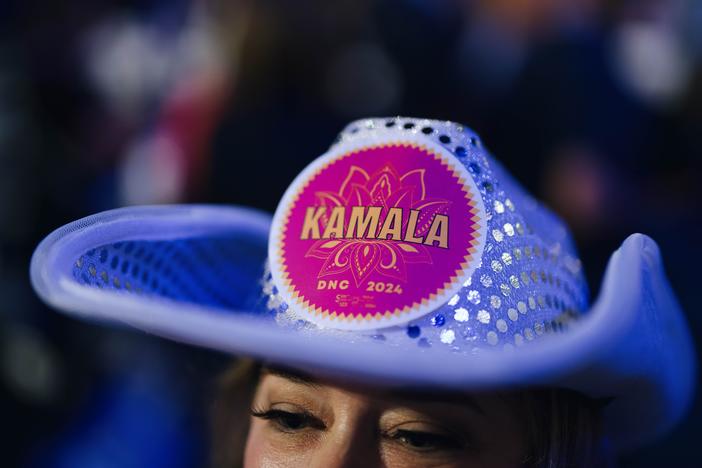Ashley Fedan, a delegate from Lakewood, Wash., wears a cowboy hat that reads "KAMALA" on the final night of the DNC. Grace Widyatmadja/NPR