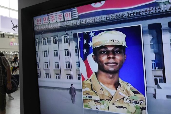 A television screen shows a file image of Pvt. Travis King during a news program at the Seoul Railway Station in Seoul, South Korea, on Aug. 16, 2023.