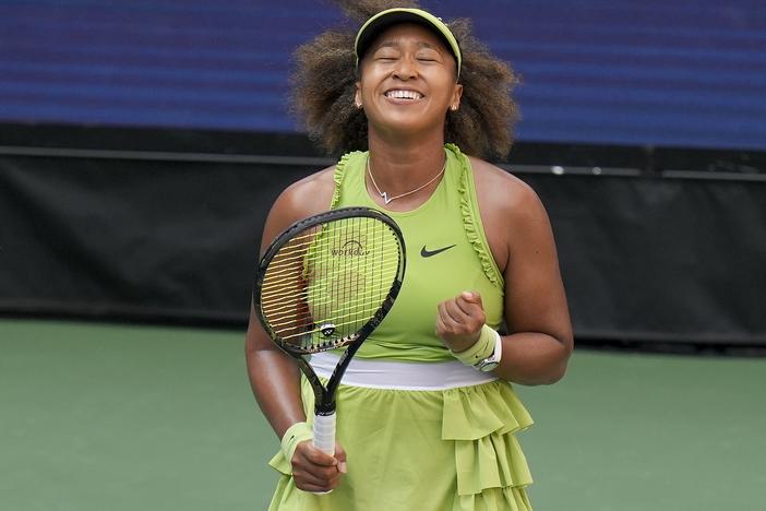 Naomi Osaka of Japan reacts after defeating Jelena Ostapenko, of Latvia, during the first round of the U.S. Open tennis championships, Tuesday, Aug. 27, 2024, in New York. 