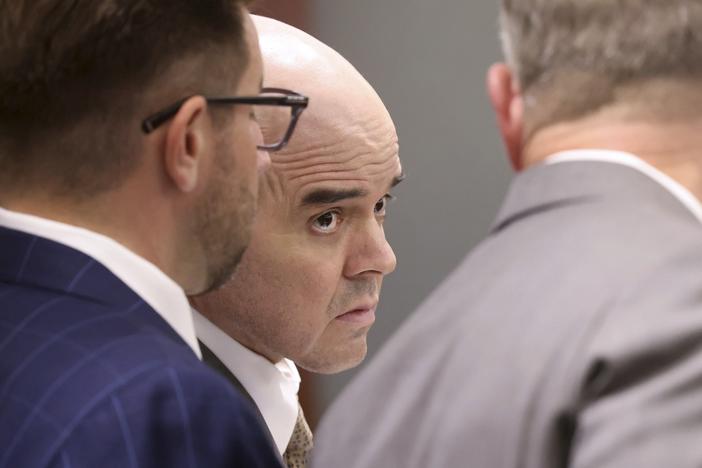 Robert Telles, center, listens in court with his attorneys Robert Draskovich, right, and Michael Horvath, prior to jury selection on the second day of his murder trial at the Regional Justice Center in Las Vegas Tuesday, Aug. 13, 2024. Telles, a former Clark County public administrator, is charged in the murder of Las Vegas Review-Journal investigative journalist Jeff German. 