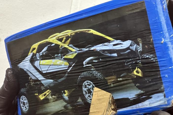 A package containing 16 bricks of suspected cocaine was discovered by guests on a beach in the Florida Keys, according to authorities.