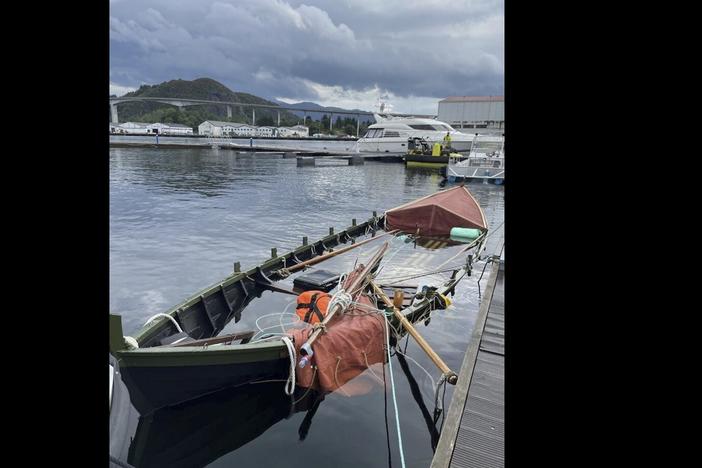 This photo released by the Norwegian Police shows the Viking ship replica, called Naddodd, moored at the quay in Måløy, Norway, on Wednesday, after it capsized earlier this week off Norway's coast.