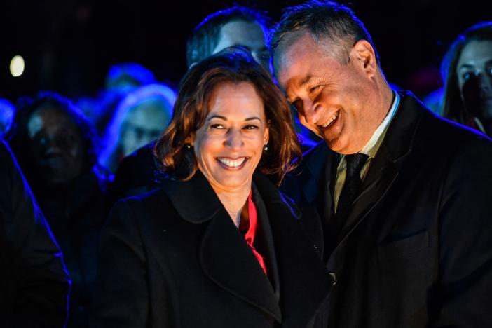In this file photo, Vice President Harris (L) and second gentleman Doug Emhoff attend the 100th National Christmas Tree Lighting on The Ellipse south of the White House in Washington, D.C., on Nov. 30, 2022. Harris and Emhoff host holiday celebrations at their official residence, including recently for Diwali and Rosh Hashanah.