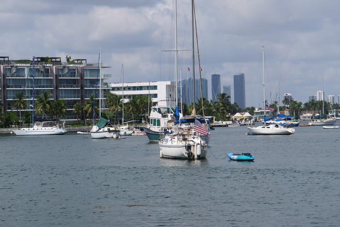 More than 100 people live aboard sailboats and other vessels anchored just off Miami Beach. For years, some in the posh seaside community have not been happy about people just offshore.