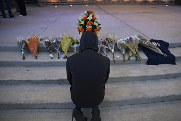 Students and residents mourn those who lost their lives near the scene of the mass shooting at Apalachee High School in Winder, Ga. 