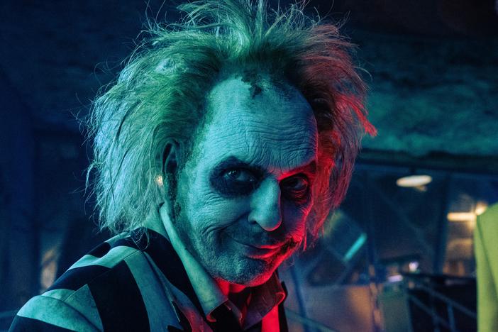 Turns out Beetlejuice (Michael Keaton) hasn't changed much in 30-odd years — he's less of a villain, but still a pain in the neck.