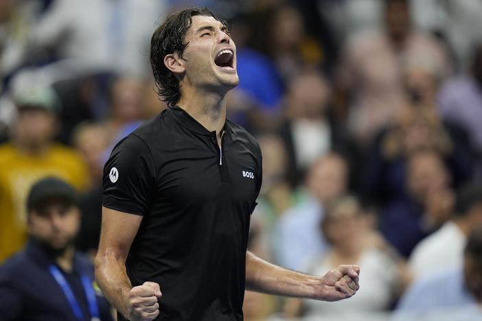 Taylor Fritz of the U.S reacts after defeating Frances Tiafoe during the men's singles semifinals of the U.S. Open tennis championships on Friday in New York. 
