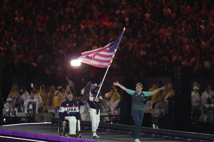 Members of the United States delegation parade Sunday during the closing ceremony of the 2024 Paralympics in Paris