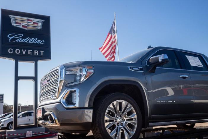 A GMC pickup truck for sale on a lot at a General Motors dealership in January 2023 in Austin, Texas. Federal regulators are proposing new regulations for vehicle design in order to protect pedestrians.  
