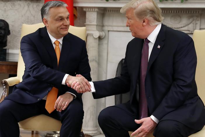 Then President Donald Trump shakes hands with Hungarian Prime Minister Viktor Orban during a meeting in the Oval Office in May 2019.
