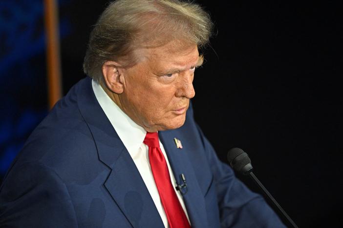 Donald Trump listens during the presidential debate with Kamala Harris.