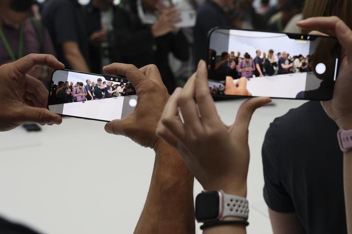 The new iPhone 16 is displayed at Apple headquarters Monday, Sept. 9, 2024, in Cupertino, Calif. 