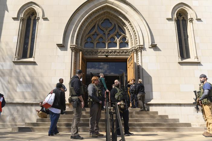 Police maintain a presence following a school lockdown after 911 calls falsely reported a gunman in Oakland Catholic and Pittsburgh Central Catholic schools on March 29, 2023.