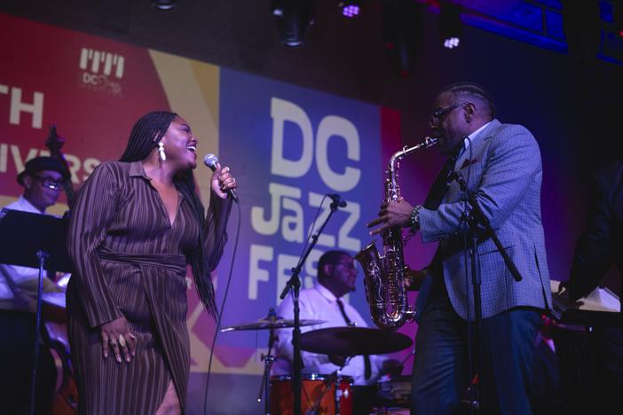 Christie Dashiell sings, and Antonio Hart plays saxophone, on opening night of DC Jazzfest with the DC Jazz All-Stars at the Hamilton Live in Washington, D.C., on Wednesday, August 28, 2024. Photo by Cheriss May, for NPR.