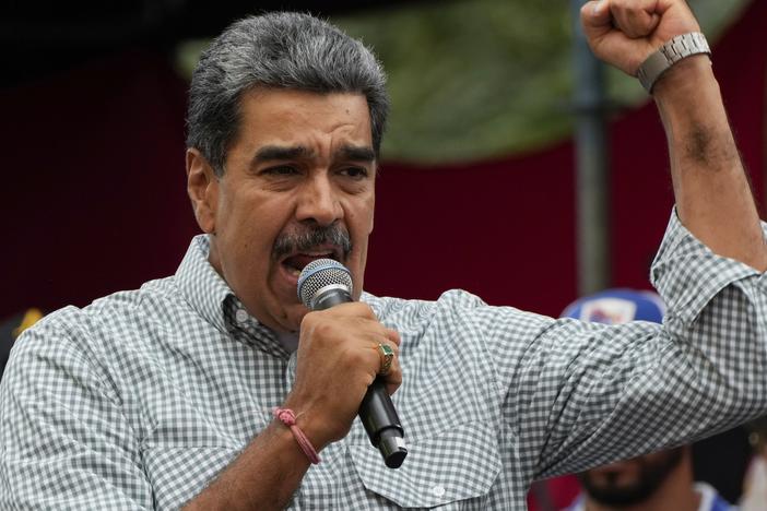 Venezuelan President Nicolas Maduro addresses government loyalists gathered at the presidential palace in support of his reelection one month after the presidential vote, in Caracas, Venezuela on Aug. 28, 2024.