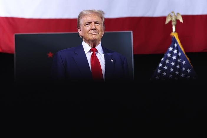 Former President Donald Trump speaks during a campaign event in Tucson, Ariz., on Thursday. Trump has used a swing through the south west to focus on economic issues but despite touting his economic policies, the candidate has continued to focus on immigration and repeating false and debunked conspiracies about immigrant communities.