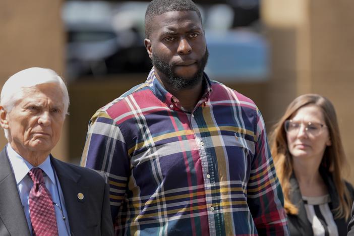 Emmitt Martin III, (second from left) a former Memphis Police Department officer who's accused of killing Tyre Nichols, walks into federal court on Aug. 23, 2024, in Memphis, Tenn.