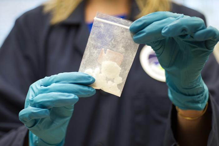 A bag of 4-fluoro isobutyryl fentanyl which was seized in a drug raid is displayed at the Drug Enforcement Administration (DEA) Special Testing and Research Laboratory in Sterling, Va., on Aug. 9, 2016.