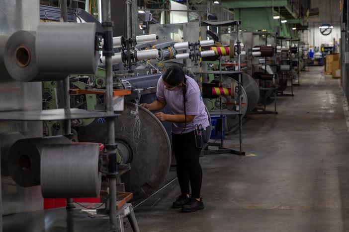 Alexandra Vazquez works in the Phifer factory, a window screen manufacturer outside Tuscaloosa, Alabama.  